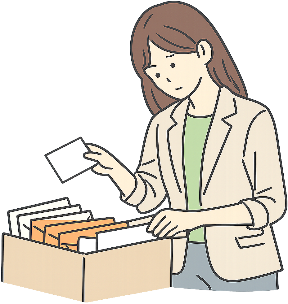 郵便物の仕分けをしている会社員